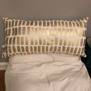 Gold throw pillow